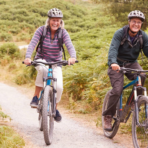 couple cycling on bikes